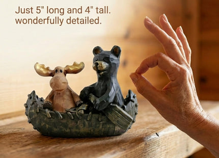 The Bridge Collection Canoeing Moose & Black Bear Figurine