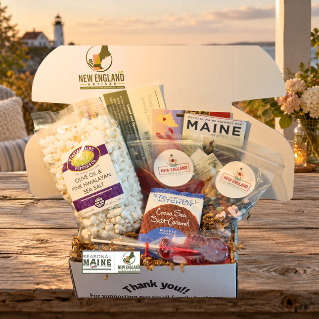 Coastal Snack Gift Box — standard photographed assortment on a Maine coastal cottage table.