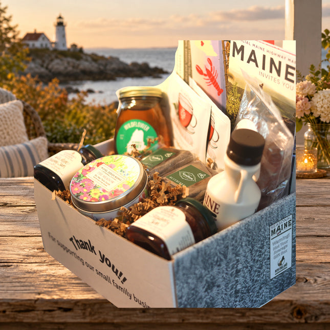 Just Because Gift Box — standard photographed assortment on a Maine coastal cottage table.
