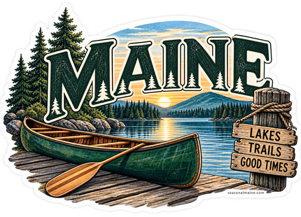 Maine Lakes, Trails & Good Times sticker artwork. A green canoe and wooden paddle rest on a lakeside dock below large MAINE lettering, beside a rustic LAKES TRAILS GOOD TIMES sign and a forested sunset scene.