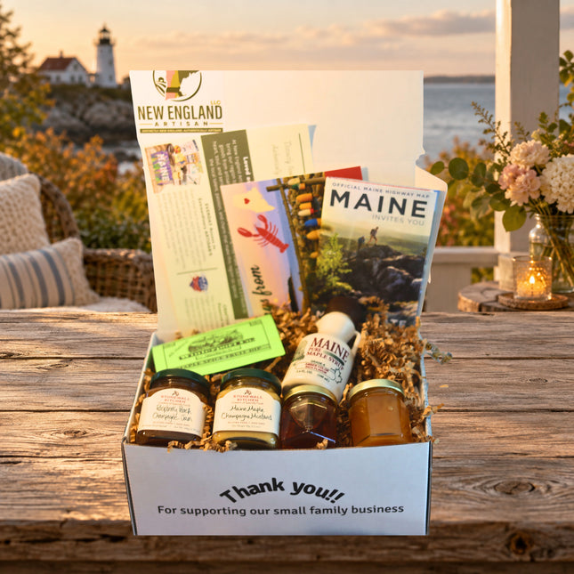 Maine Sampler Gift Box — standard photographed assortment on a Maine coastal cottage table.