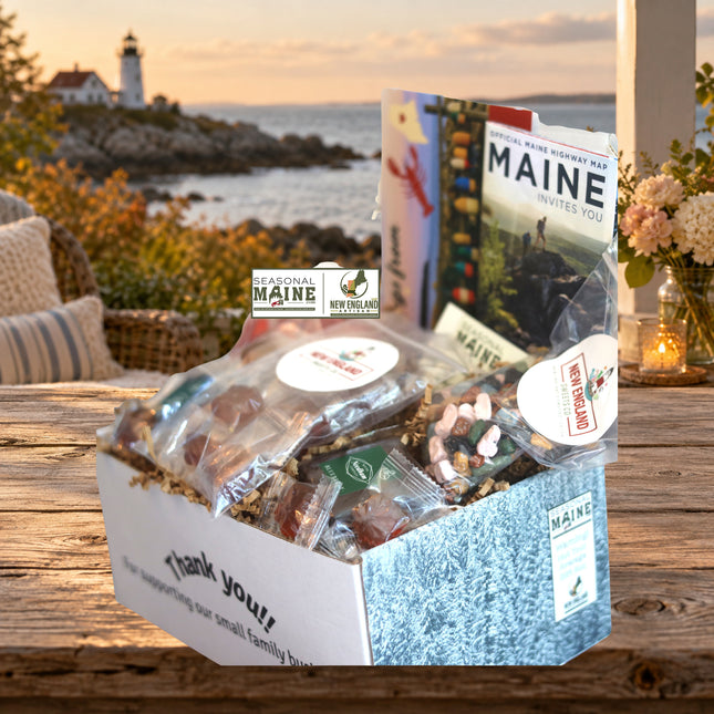 Sweet Maine Treats Gift Box — standard photographed assortment on a Maine coastal cottage table.