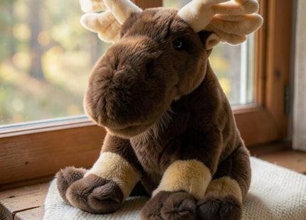 Martin the Moose – 11" Stuffed Animal Plush in a styled lifestyle setting with Seasonal Maine logo watermark