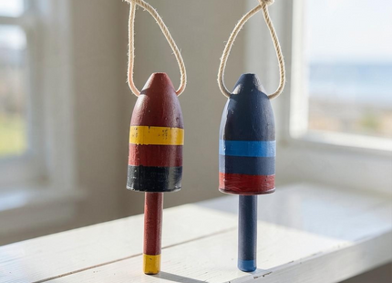 6.5" Colorful Nautical Buoys - 2 Assorted Designs in a styled lifestyle setting with Seasonal Maine logo watermark
