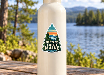 Pine Trees & Salt Air Maine Vinyl Sticker – 3 Inch shown on a reusable water bottle in a styled setting, with Seasonal Maine logo. Includes sticker only.